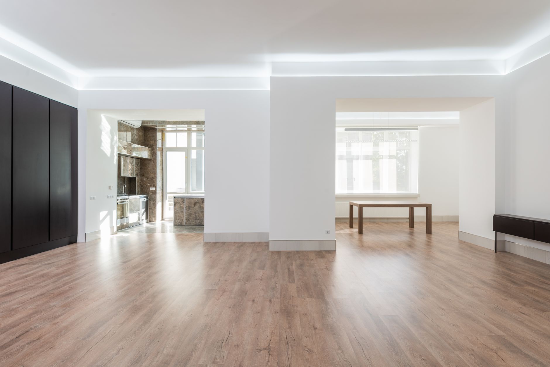 Spotless architectural apartment interior living room window and clean hardwood floors
